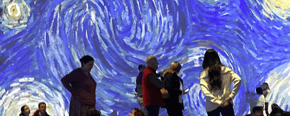 People enjoying close up of Starry Night in the immersive exhibit. (2019)